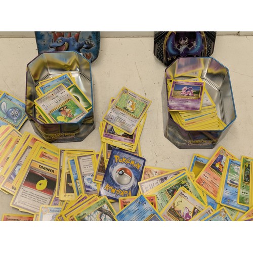 1978 - A Selection of Pokemon Evolition cards in tins