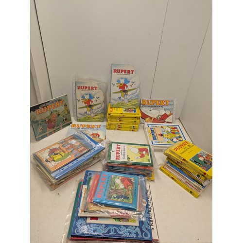 252 - Rupert bear a large collection of both vintage and modern books