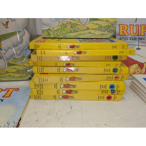 252 - Rupert bear a large collection of both vintage and modern books