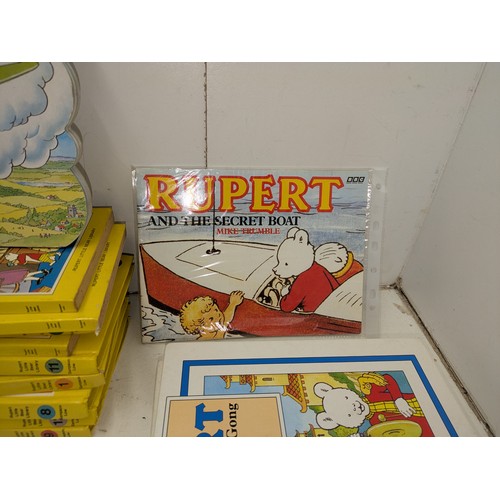 252 - Rupert bear a large collection of both vintage and modern books