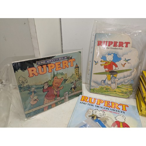 252 - Rupert bear a large collection of both vintage and modern books