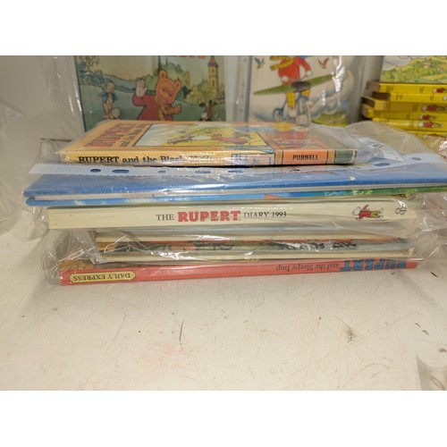 252 - Rupert bear a large collection of both vintage and modern books