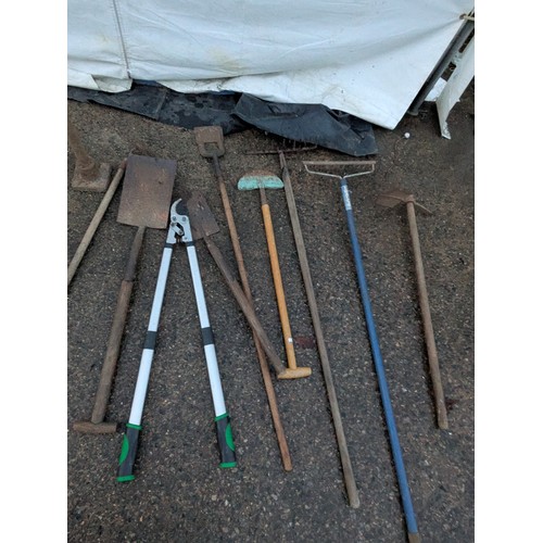 238 - A large selection of garden tools including spades shovels forks etc