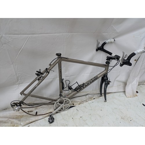 207 - A Cannondale super light aluminium racing bike bicycle frame with campagnolo components