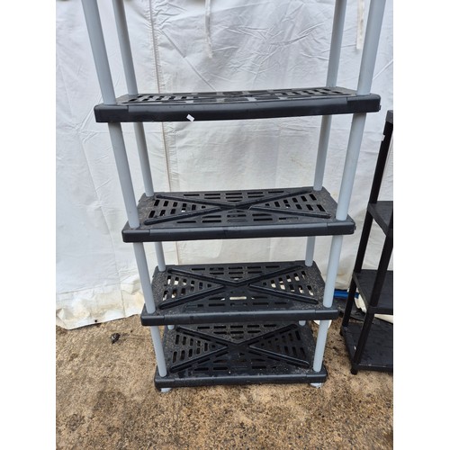 211 - Pair of collapsible plastic shelving units