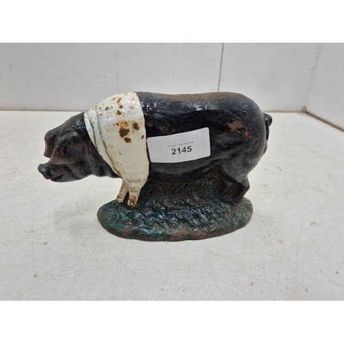 2145 - A cast iron pig doorstop