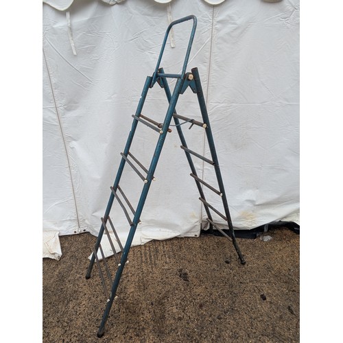 2 - A vintage metal folding ladder