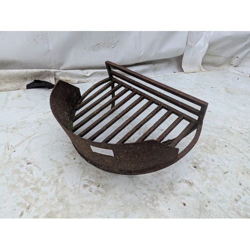 7 - A wrought iron fire grate