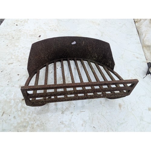 7 - A wrought iron fire grate