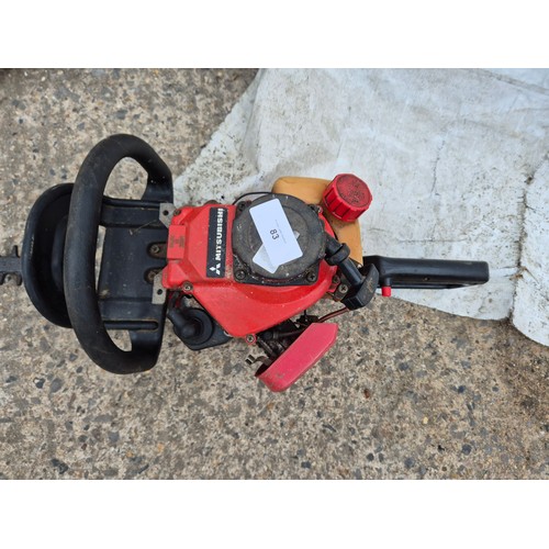 83 - A mitsubishi petrol hedge trimmer