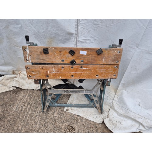 87 - A folding metal work table