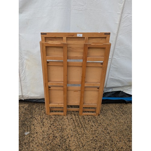 408 - A natural pine folding bookcase