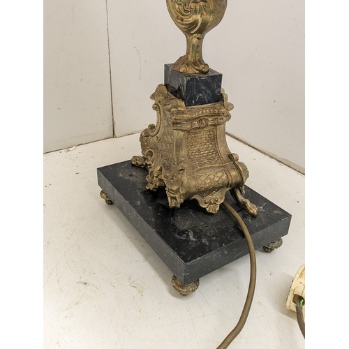 434 - A pair of ornate brass coloured table lamps