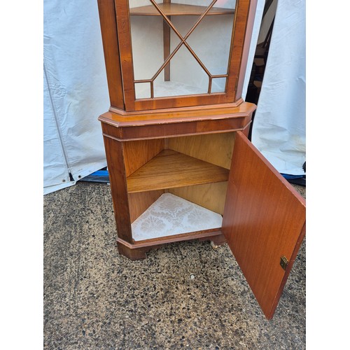 444 - A mahogany vernier corner display case with underlying drawer