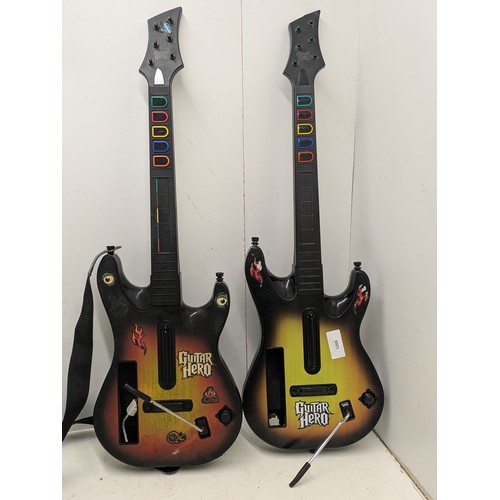 1208 - A pair of guitar hero guitars for the Nintendo Wii