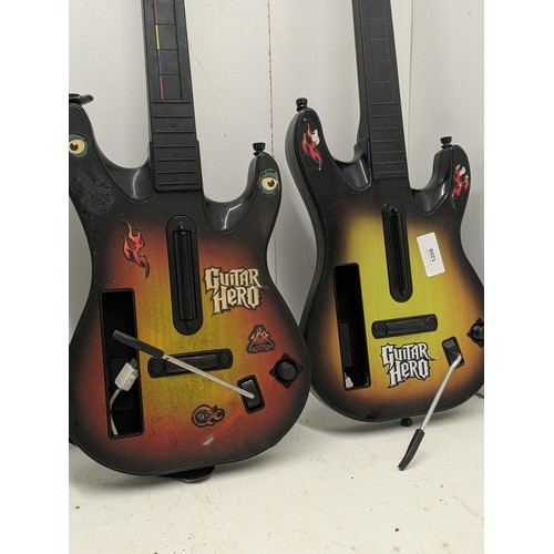 1208 - A pair of guitar hero guitars for the Nintendo Wii