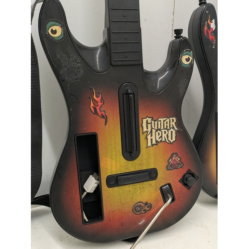 1208 - A pair of guitar hero guitars for the Nintendo Wii