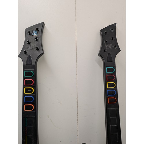 1208 - A pair of guitar hero guitars for the Nintendo Wii