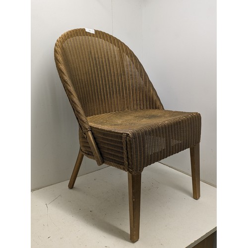 427 - A genuine lloyd loom wicker chair