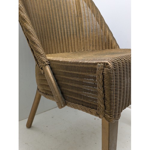 427 - A genuine lloyd loom wicker chair