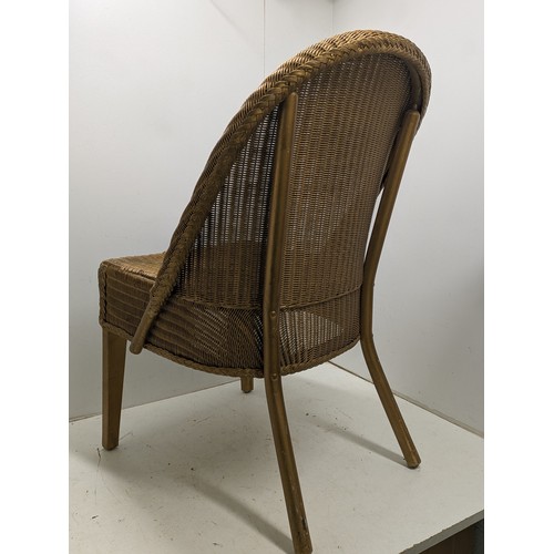 427 - A genuine lloyd loom wicker chair