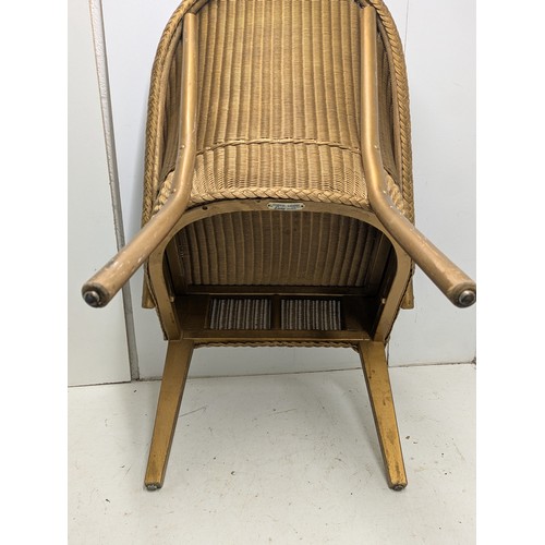 427 - A genuine lloyd loom wicker chair