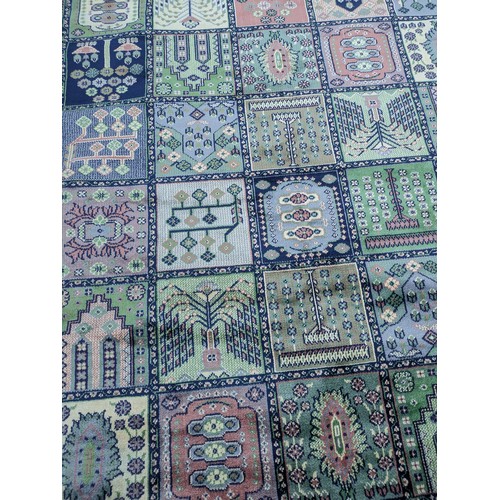 430 - A wool patterned area rug