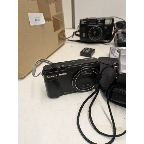 1278 - A selection of cameras and photography equipment including Panasonic DMC -lz30