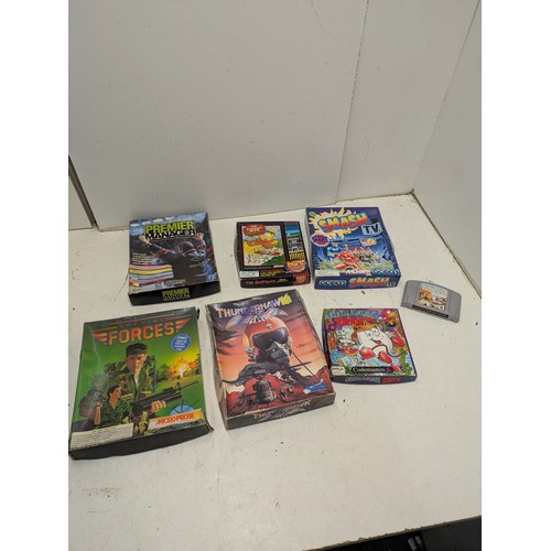 1202 - A selection of retro games including SNES Star Wars Episode 1 Racer, various Amiga games, etc