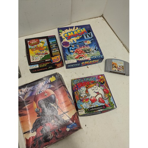 1202 - A selection of retro games including SNES Star Wars Episode 1 Racer, various Amiga games, etc