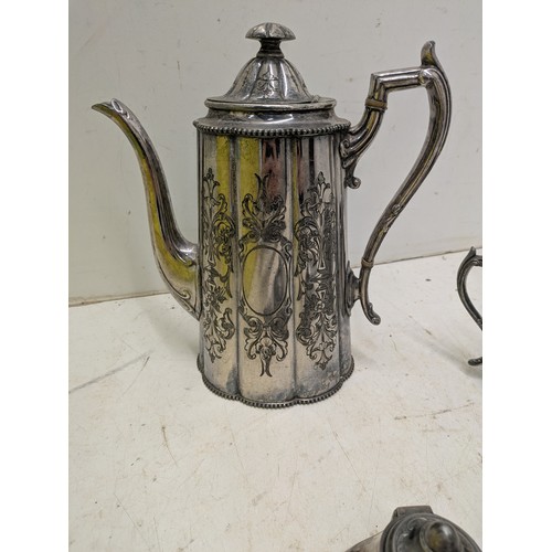 880 - A selection of silver plated objects including jugs, cigarette cases, inkwells etc