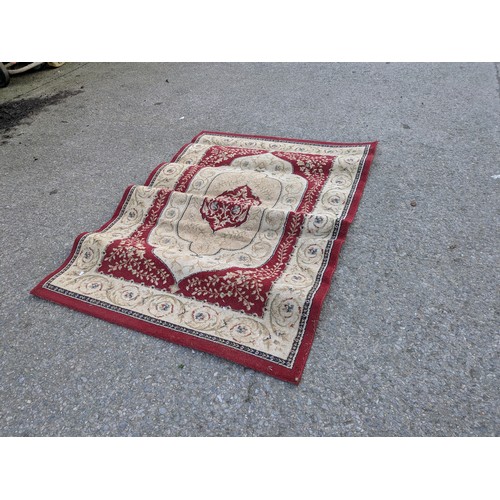 443 - A vintage wool area rug