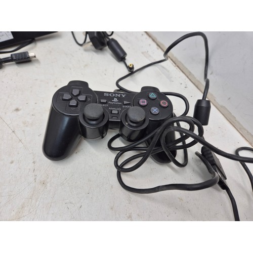 1281 - a Sony Playstation 2 slim console with cables and controller