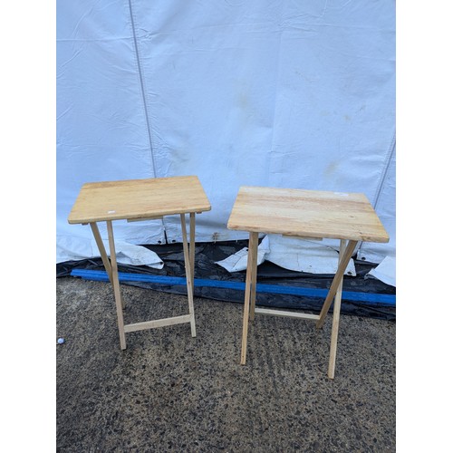 431 - A pair of folding pine tables