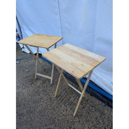 431 - A pair of folding pine tables