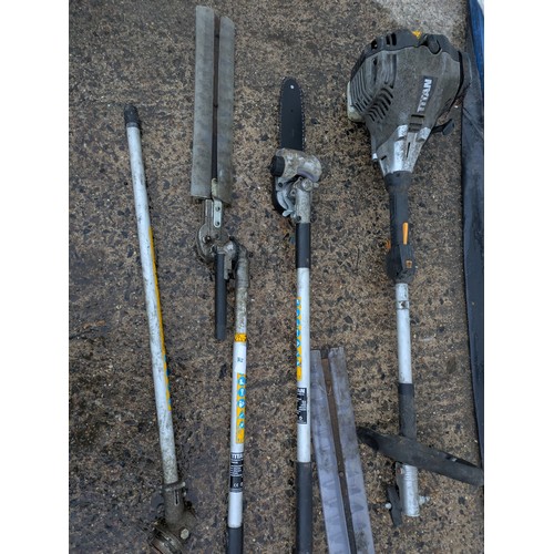 94 - A Titan petrol strimmer with a variety of attachments