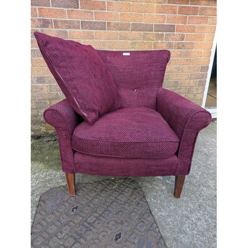 391 - A purple fabric upholstered armchair