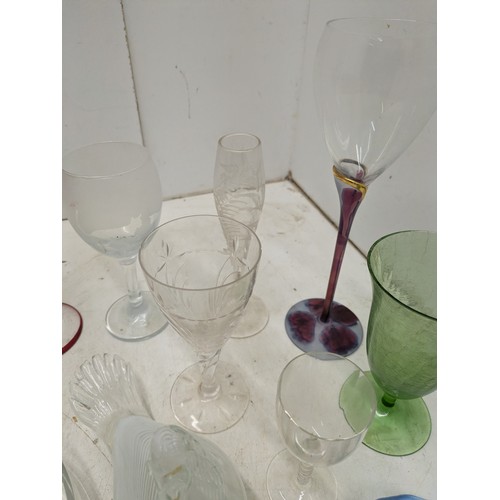 1063 - A selection of various glassware, including ornaments, wine glasses, etc