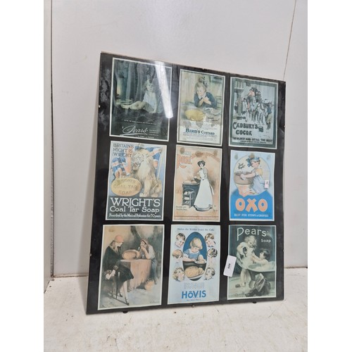 1083 - A framed modern printed selection of retro advertising signs