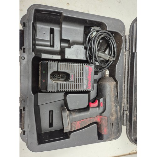 1702 - A snap on impact driver model ctu3850 with battery and charger in case