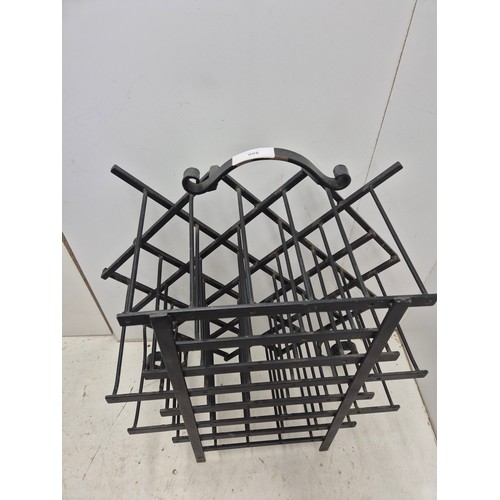 608 - A wrought iron, 21 bottle wine rack