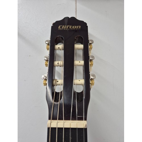 2034 - A Clifton acoustic guitar in carry bag