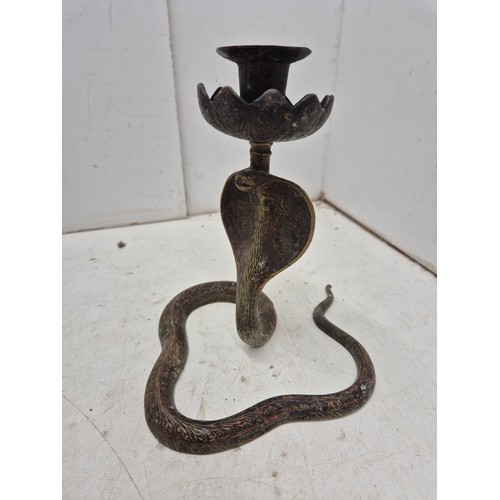 636 - A pair of candle holders in the shape of a snake