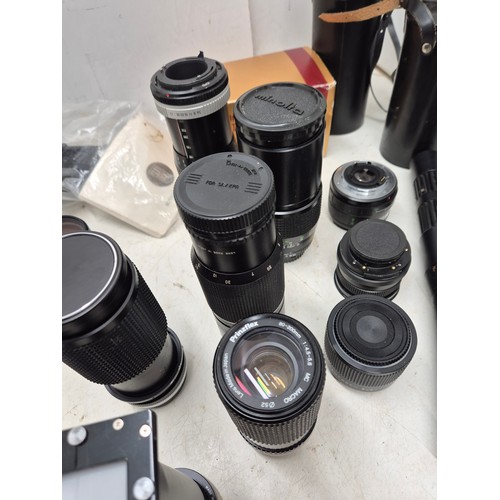 1061 - A large selection of various camera lenses including Minolta, Osawa, etc