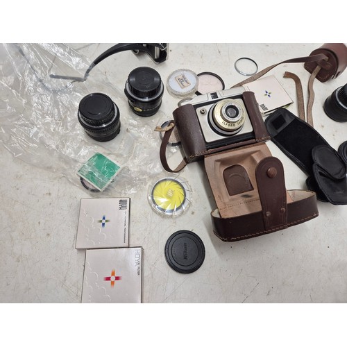 1065 - A selection of camera equipment including filters, Ilford sporting, etc