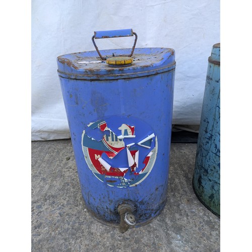 1000 - Fina motortonic, multigrade oil barrel with a BP lid and brass tap. With another unnamed oil can wit... 