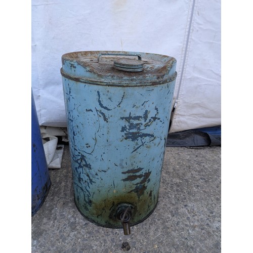 1000 - Fina motortonic, multigrade oil barrel with a BP lid and brass tap. With another unnamed oil can wit... 