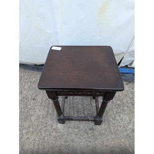 465 - A small oak corner table