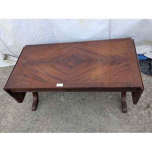 462 - A mahogany vernier drop leaf coffee table