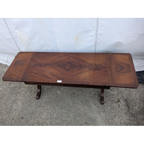 462 - A mahogany vernier drop leaf coffee table